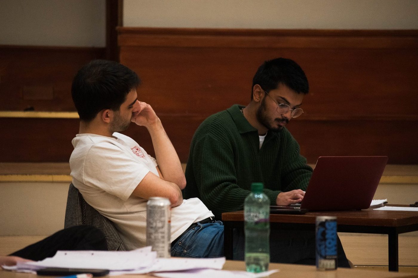 Two members preparing a case at a laptop during the Edinburgh Cup