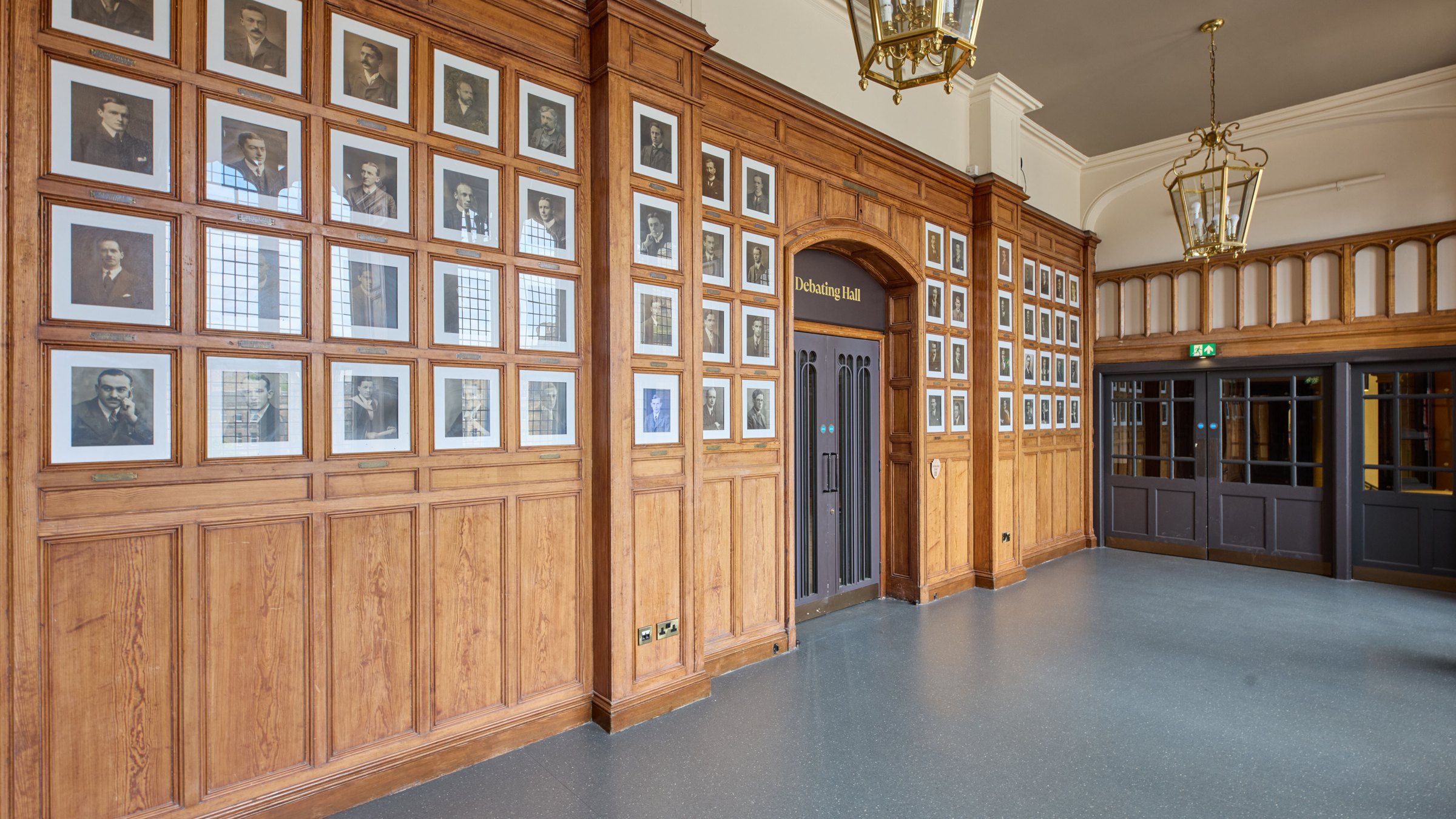 A panelled corridor at Teviot hung with framed portraits
